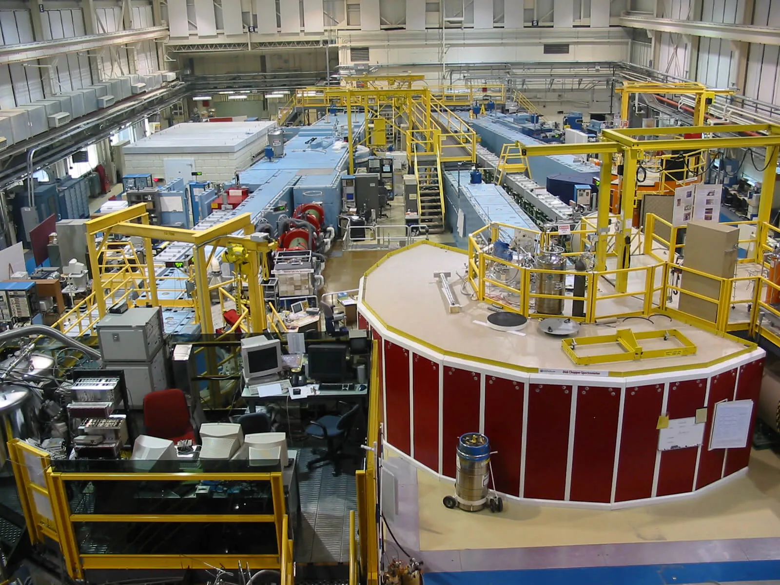 Guide Hall of the NIST Center for Neutron Research. The NIST Center for Neutron Research (NCNR) serves more customers than all other U.S. neutron facilities combined. Beams of cold, slowed down neutrons pass through guide tubes (blue structures) to reach specialized instruments where they are used as probes to see material structures.