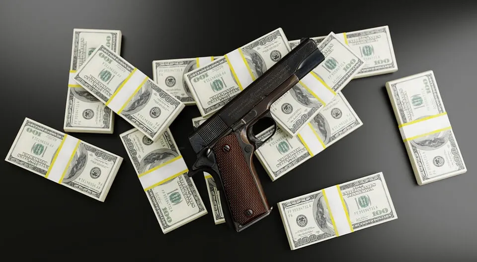 Firearms overlayed over money